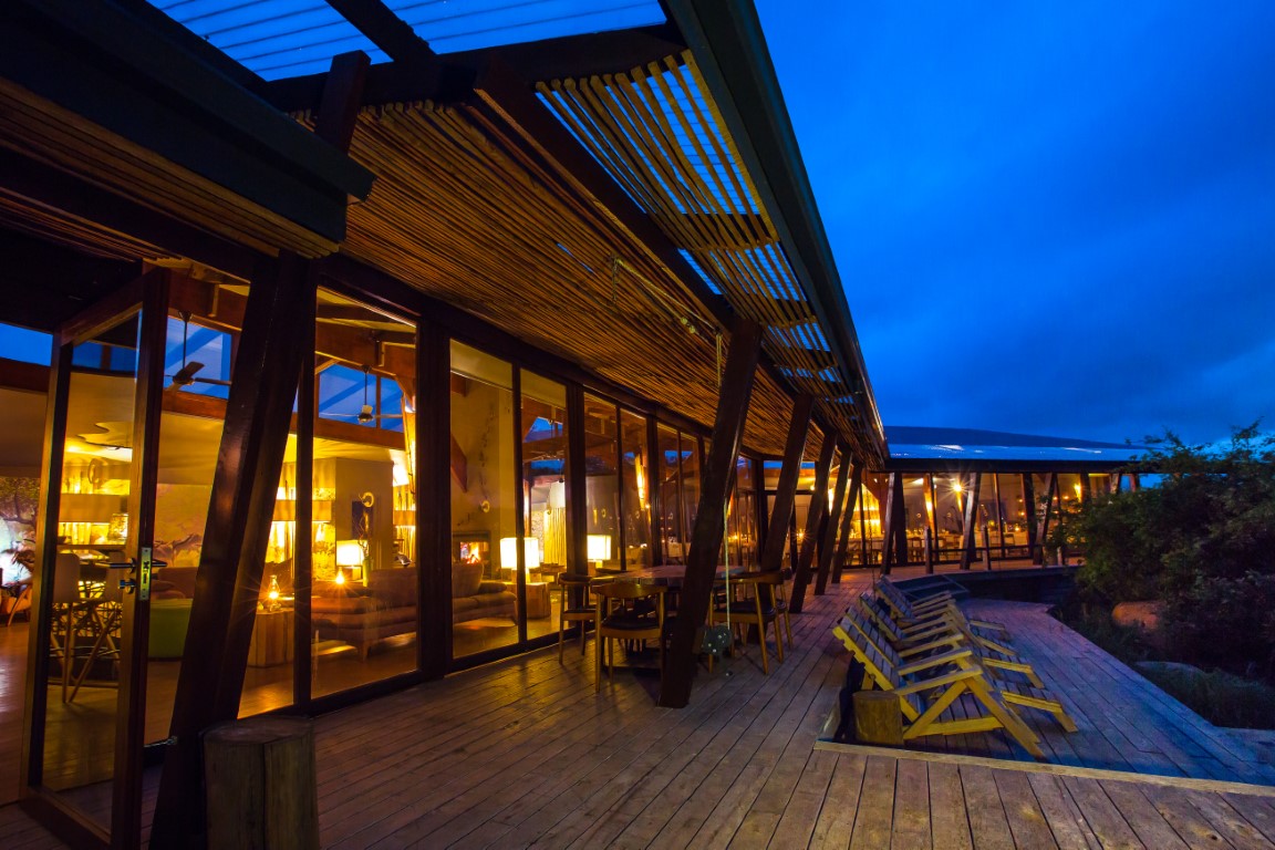 Main lodge lounge and deck at night